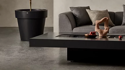 EcoSmart Fire Gin 90 Low fire table elevates a private residence patio with a sleek ethanol outdoor fire table and modern flame feature.