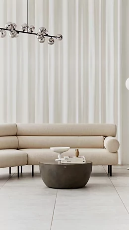 Blinde Design Curv 40 concrete coffee table centres a private residence living room, offering a sculptural round focal point for modern lounge style.